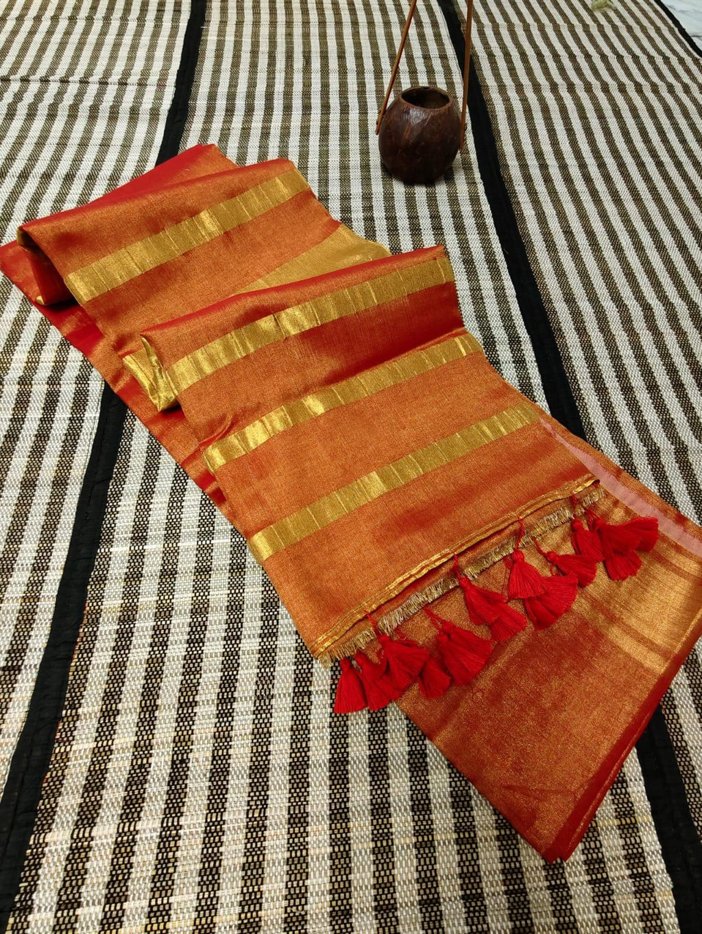 Tissue Silk Saree, Orange, folded view, golden zari and embroidery